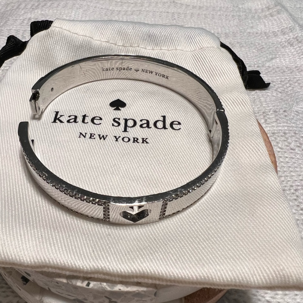 Kate Spade Silver hinged Bracelet with diamond a